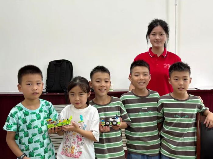 ��E��һ�⡱־Ը��������������l������`�������̰�ͯ�У�AI����֪�����p�o��^��